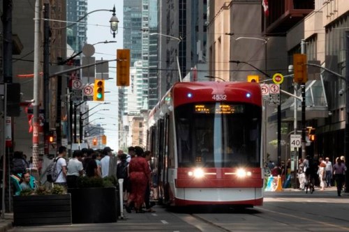 Transit riders board a streetcar in downtown Toronto on Wednesday, July 10, 2019. Ridership on two of Ontario's largest transit agencies is down between 80 and 90 per cent since the start of the COVID-19 pandemic, in a situation a national industry group said mirrors the experience of many local services. THE CANADIAN PRESS/Graeme Roy