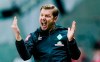 Bremen's head coach Florian Kohfeldt gestures during the German soccer cup quarter final match between Eintracht Frankfurt and Werder Bremen in Frankfurt, Germany, Wednesday, March 4, 2020. Werder Bremen coach Florian Kohfeldt isn’t having any luck at the moment. Bremen was knocked out of the German Cup on Wednesday (0-2) and faces a struggle to remain in the Bundesliga after losing its last five league games in a row. (Uwe Anspach/dpa via AP)