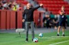 Leverkusen's head coach Peter Bosz gestures during the German Soccer Cup first round match between Bayer 04 Leverkusen and Eintracht Norderstedt in Leverkusen, Germany, Sunday, Sept. 13, 2020. (Rolf Vennenbernd/dpa via AP)