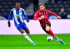 Hertha's Dodi Lukebakio, left, and Freiburg's Lucas Hoeler, right challenge for the ball during the German Bundesliga soccer match between Hertha BSC Berlin and SC Freiburg in Berlin, Germany, Saturday, Dec. 14, 2019. (Soeren Stache/dpa via AP)