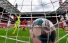 Union's Marvin Friedrich, third left, scores the opening goal during the German Bundesliga soccer match between 1. FC Cologne and 1. FC Union Berlin in Cologne, Germany, Saturday, June 13, 2020. The German Bundesliga is the world's first major soccer league to resume after a two-month suspension because of the coronavirus pandemic. (AP Photo/Martin Meissner, Pool)