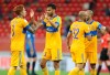 Tigres UANL players celebrate after winning against Ulsan Hyundai during FIFA Club World Cup in Al Rayyan, Qatar, Thursday, Feb. 4, 2021. (AP Photo/Hussein Sayed)