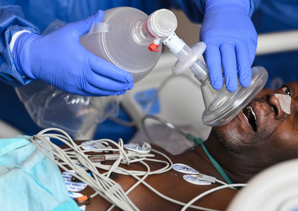 CP
Nathan Denette's NNA-winning photograph in the General News Photo category of a 60-year-old COVID-19 patient fighting for his life, desperately gasping for air in the intensive care unit at the Humber River Hospital in Toronto in 2021. THE CANADIAN PRESS FILES/Nathan Denette