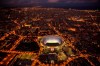 FILE - In this Tuesday, Sept. 19, 2017 file photo, the Camp Nou stadium is illuminated in Barcelona, Spain. All upcoming professional soccer games in Spain, France and Portugal, as well as some in Germany and a European Championship qualifying match in Slovakia, will be played in empty stadiums because of the coronavirus outbreak. For most people, the new coronavirus causes only mild or moderate symptoms, such as fever and cough. For some, especially older adults and people with existing health problems, it can cause more severe illness, including pneumonia. (AP Photo/Emilio Morenatti)