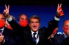 Joan Laporta celebrates his victory after elections at the Camp Nou stadium in Barcelona, Spain, Sunday, March 7, 2021. Joan Laporta has been elected Barcelona's president on Sunday, inheriting a club mired in debt and facing daunting problems that include the possible departure of Messi when his contract ends at the end of the season. (AP Photo/Joan Monfort)