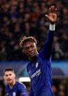 Chelsea's Tammy Abraham celebrates scoring the opening goal during the Champions League Group H soccer match between Chelsea and Lille at Stamford Bridge stadium in London Tuesday, Dec. 10, 2019. (AP Photo/Kirsty Wigglesworth)