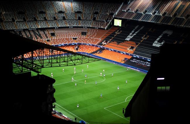 General view of Mestalla stadium during the Champions League round of 16 second leg soccer match between Valencia and Atalanta in Valencia, Spain, Tuesday March 10, 2020. The match is being in an empty stadium because of the coronavirus outbreak. (AP Photo/Emilio Morenatti)