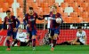 Barcelona's Lionel Messi celebrates scoring his side's first goal during the Spanish La Liga soccer match between Valencia and Barcelona at the Mestalla stadium in Valencia, Spain, Sunday, May 2, 2021. (AP Photo/Alberto Saiz)