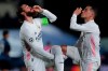 Real Madrid's Sergio Ramos, left, celebrates scoring his side's 2nd goal during the Champions League, round of 16, second leg soccer match between Atalanta and Real Madrid at the Alfredo di Stefano stadium in Madrid, Spain, Tuesday, March 16, 2021. (AP Photo/Bernat Armangue)