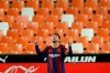 Barcelona's Lionel Messi celebrates scoring his side's 3rd goal during the Spanish La Liga soccer match between Valencia and Barcelona at the Mestalla stadium in Valencia, Spain, Sunday, May 2, 2021. (AP Photo/Alberto Saiz)