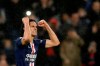 PSG's Edinson Cavani celebrates his goal against Bordeaux during the French League One soccer match between Paris-Saint-Germain and Bordeaux at the Parc des Princes stadium in Paris, Sunday Feb. 23, 2020. (AP Photo/Christophe Ena)