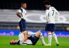 Tottenham's Harry Kane lies injured on the pitch during the English Premier League soccer match between Tottenham Hotspur and Liverpool at the Tottenham Hotspur Stadium in London, Thursday, Jan. 28, 2021. (Catherine Ivill/Pool via AP)