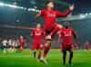 Liverpool's Roberto Firmino celebrates after a disallowed goal during the English Premier League soccer match between Liverpool and Manchester United at Anfield Stadium in Liverpool, Sunday, Jan. 19, 2020.(AP Photo/Jon Super)