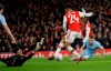Arsenal's Reiss Nelson shoots on goal to score his side's first goal during the English FA Cup soccer match between Arsenal and Leeds United at the Emirates Stadium in London, Monday, Jan. 6, 2020.(AP Photo/Kirsty Wigglesworth)