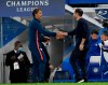 Sevilla's head coach Julen Lopetegui, left, and Chelsea's head coach Frank Lampard shake hands after the Champions League Group E soccer match between Chelsea and Sevilla at Stamford Bridge Stadium in London, England, Tuesday, Oct. 20, 2020.(Toby Melville/Pool via AP)