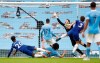 Chelsea's Marcos Alonso scores the winning goal during the English Premier League soccer match between Manchester City and Chelsea at the Etihad Stadium in Manchester, Saturday, May 8, 2021.(Martin Rickett/Pool via AP)