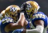 CP
Winnipeg Blue Bombers' Rasheed Bailey, right, celebrates his touchdown against the B.C. Lions with Nic Demski during the first half of a CFL football game in Vancouver, on Friday, October 1, 2021. THE CANADIAN PRESS/Darryl Dyck