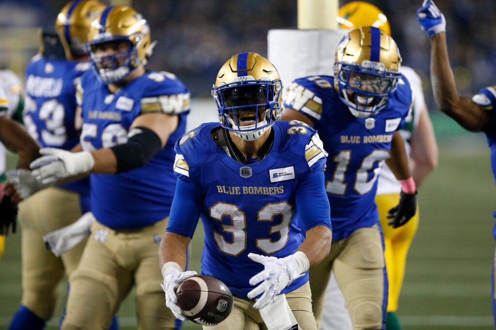 CP
Running back Andrew Harris got two touchdowns and ran for 150 yards Friday. (John Woods / The Canadian Press)