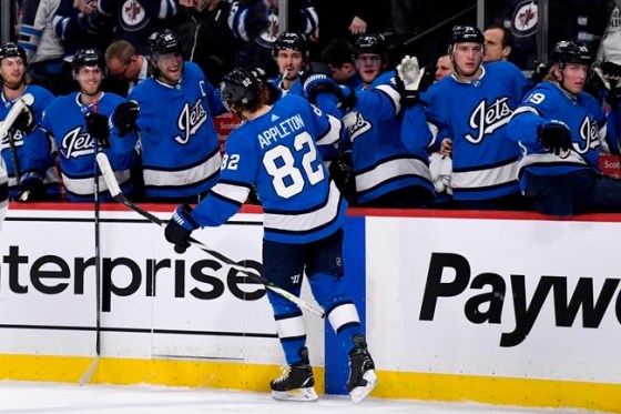 Winnipeg Jets' Mason Appleton (82) celebrates his goal with teammates on the bench during second period NHL action against the Los Angeles Kings, in Winnipeg on Tuesday, Feb. 18, 2020. THE CANADIAN PRESS/Fred Greenslade