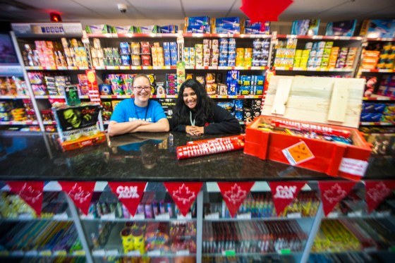MIKAELA MACKENZIE / WINNIPEG FREE PRESSAmber Proutt (left) and Emma Fernando show off some of the store's top picks at Red Bomb Fireworks.