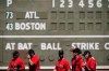 The Boston Red Sox's players walk on the field before a spring training baseball game against the Atlanta Braves on Monday, March 1, 2021, in Fort Myers, Fla. (AP Photo/Brynn Anderson)