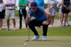 Jack Dyer, of the Great Britain and Ireland team, lines up a putt on the 11th hole in the foursome matches during the Walker Cup golf tournament at the Seminole Golf Club on Sunday, May 9, 2021, in Juno Beach, Fla. (AP Photo/Brynn Anderson)