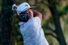 Sungjae Im. Of South Korea, watches his tee shot on the ninth hole during the second round of the The Players Championship golf tournament Friday, March 12, 2021, in Ponte Vedra Beach, Fla. (AP Photo/John Raoux)