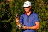 Justin Thomas holds the trophy after winning The Players Championship golf tournament Sunday, March 14, 2021, in Ponte Vedra Beach, Fla. (AP Photo/John Raoux)