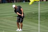 Brooks Koepka hits to the 16th green during a practice round for The Players Championship golf tournament Wednesday, March 11, 2020, in Ponte Vedra Beach, Fla. (AP Photo/Chris O'Meara)