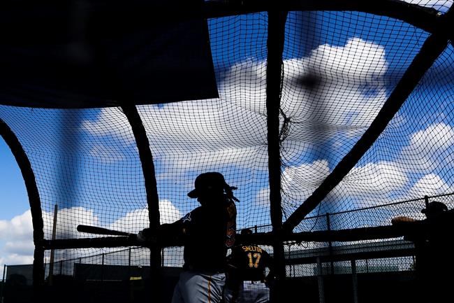 Pittsburgh Pirates' Josh Bell takes batting practice during a spring training baseball workout Monday, Feb. 17, 2020, in Bradenton, Fla. (AP Photo/Frank Franklin II)