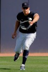 New York Yankees' Aaron Judge catches a ball during a spring training baseball workout Tuesday, Feb. 18, 2020, in Tampa, Fla. (AP Photo/Frank Franklin II)