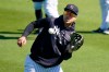New York Yankees' Giancarlo Stanton catches a ball during a spring training baseball workout Tuesday, Feb. 23, 2021, in Tampa, Fla. (AP Photo/Frank Franklin II)