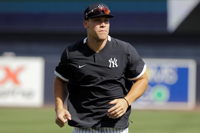 New York Yankees' Aaron Judge runs on the field during a spring training baseball workout Tuesday, Feb. 18, 2020, in Tampa, Fla. (AP Photo/Frank Franklin II)