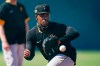 Pittsburgh Pirates' Ke'Bryan Hayes takes part in a drill during a spring training baseball workout Thursday, Feb. 25, 2021, in Bradenton, Fla. (AP Photo/Frank Franklin II)