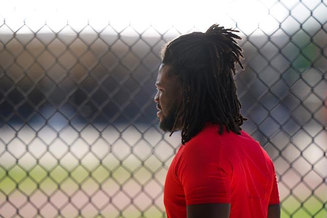 Philadelphia Phillies' Odubel Herrera walks near the field during a spring training baseball workout Wednesday, Feb. 24, 2021, in Clearwater, Fla. (AP Photo/Frank Franklin II)