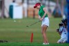 Gaby Lopez, of Mexico, chips onto the 18th green during extra holes in the Tournament of Champions LPGA golf tournament Sunday, Jan. 19, 2020, in Lake Buena Vista, Fla. After five extra holes, Lopez and Nasa Hataoka, of Japan, will return on Monday to break the tie. John Smoltz, former baseball pitcher, won the celebrity field. (AP Photo/Gary McCullough)
