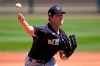 New York Yankees starting pitcher Corey Kluber delivers during the first inning of a spring training exhibition baseball game against the Detroit Tigers in Lakeland, Fla., Tuesday, March 23, 2021. (AP Photo/Gene J. Puskar)