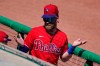 Philadelphia Phillies' Bryce Harper gestures in the dugout during a spring training exhibition baseball game against the Detroit Tigers in Clearwater, Fla., Wednesday, March 10, 2021. Harper was designated hitter for the game and went 0-3. (AP Photo/Gene J. Puskar)