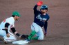 Atlanta Braves' Ender Inciarte is tagged out at third base by Baltimore Orioles third baseman Rio Ruiz (14) as he tries to advance on a Pablo Sandoval base hit during the fifth inning of a spring training baseball game Wednesday, March 17, 2021, in Sarasota, Fla. (AP Photo/John Bazemore)