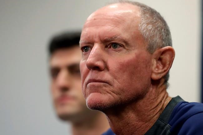 Ron Roenicke, right, speaks as Red Sox Chief Baseball Officer Chaim Bloom looks on after being after being named interim of the Boston Red Sox baseball team Tuesday, Feb. 11, 2020, in Fort Myers, Fla. at left. (AP Photo/John Bazemore)