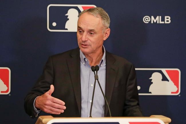 MLB Commissioner Rob Manfred answers questions at a press conference during MLB baseball owners meetings, Thursday, Feb. 6, 2020, in Orlando, Fla. (AP Photo/John Raoux)