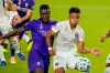 Orlando City forward Daryl Dike, left, and Inter Miami's Juan Agudelo battle for possession of the ball off a corner kick during the first half of an MLS soccer match, Saturday, Sept. 12, 2020, in Orlando, Fla. (AP Photo/John Raoux)
