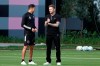 InterMiami co-owner David Beckham, right, talks with head coach Diego Alonso during an MLS training session, Thursday, March 12, 2020, in Fort Lauderdale, Fla. Major League Soccer is shutting down for 30 days because of the coronavirus, delaying the home opener for the expansion InterMiami team co-owned by former England captain David Beckham. The vast majority of people recover from the new coronavirus. According to the World Health Organization, most people recover in about two to six weeks, depending on the severity of the illness. (Joe Cavaretta/South Florida Sun-Sentinel via AP)