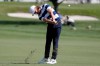 Tommy Fleetwood of England hits his second shot on the first hole during the third round of the Honda Classic golf tournament, Saturday, Feb. 29, 2020, in Palm Beach Gardens, Fla. (AP Photo/Lynne Sladky)