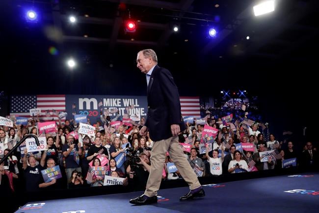 Democratic presidential candidate former New York City Mayor Mike Bloomberg walks off stage after speaking during a rally, Tuesday, March 3, 2020, in West Palm Beach, Fla. (AP Photo/Lynne Sladky)