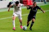 Inter Miami midfielder Lewis Morgan (7) and New York City FC midfielder Alexandru Mitrita (28) go for the ball during the first half of an MLS soccer match, Saturday, Oct. 3, 2020, in Fort Lauderdale, Fla. (AP Photo/Lynne Sladky)