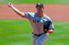 New York Yankees starting pitcher Corey Kluber throws against the Toronto Blue Jays during the first inning of a baseball game Wednesday, April 14, 2021, in Dunedin, Fla. (AP Photo/Mike Carlson)