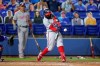 Washington Nationals' Josh Harrison hits a three-run home run against the Toronto Blue Jays during the fourth inning of a baseball game Wednesday, April 28, 2021, in Dunedin, Fla. (AP Photo/Mike Carlson)