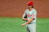Philadelphia Phillies starting pitcher Aaron Nola reacts after giving up a single to Tampa Bay Rays' Hunter Renfroe to score the third Rays run during the third inning of a baseball game Sunday, Sept. 27, 2020, in St. Petersburg, Fla. (AP Photo/Mike Carlson)