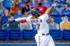 Toronto Blue Jays' Vladimir Guerrero Jr. follows through on a grand slam home run against the Washington Nationals during the third inning of a baseball game Thursday, April 27, 2021, in Dunedin, Fla. (AP Photo/Mike Carlson)